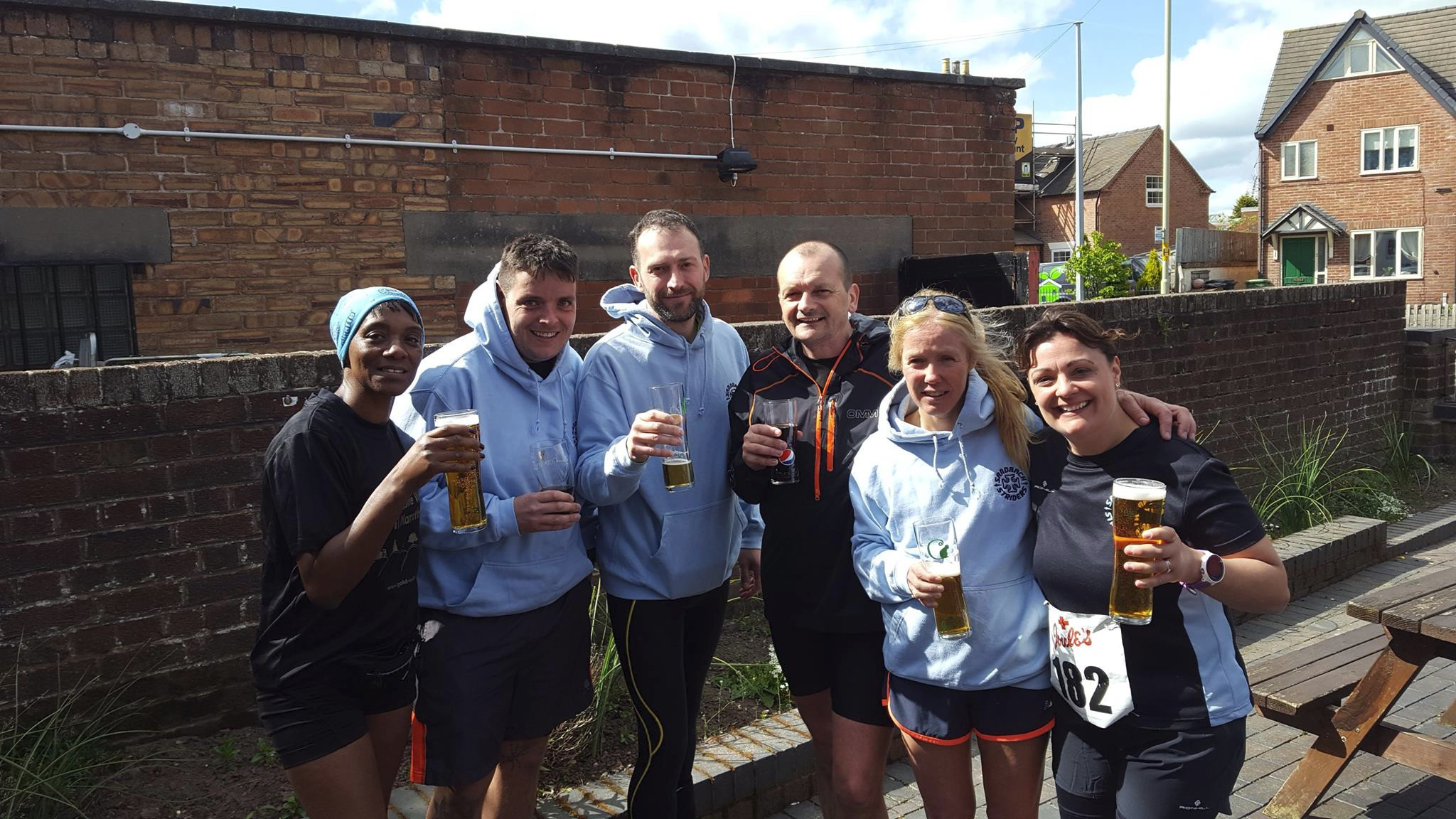 June Wray, Chris Holden, Jan Peake, Paul Nicholls, Jayne Pyatt and Katie Payne enjoying a pint after the Newcastle Way Marathon